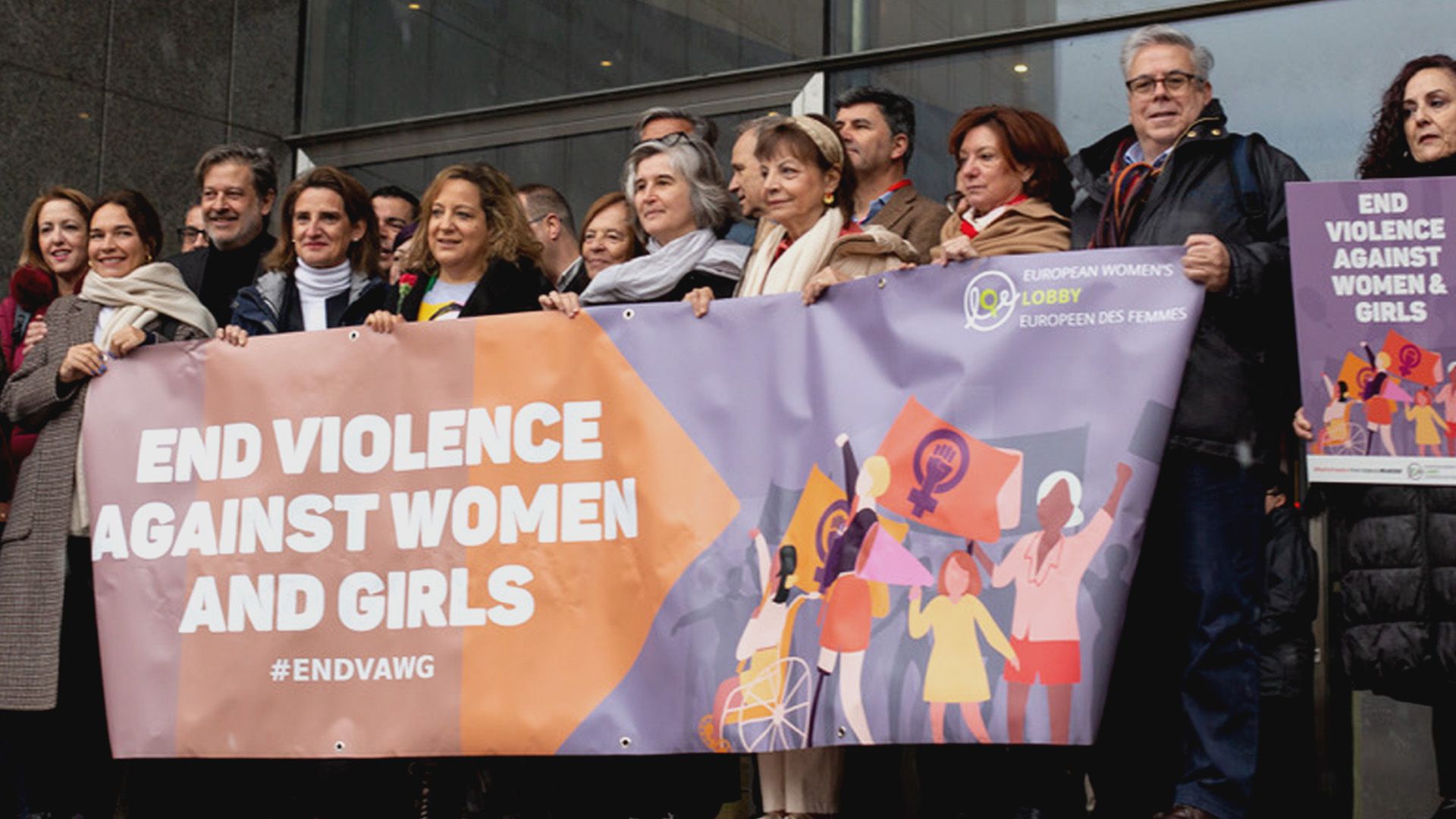 Image of MEPs holding banner that says End violence against women and girls