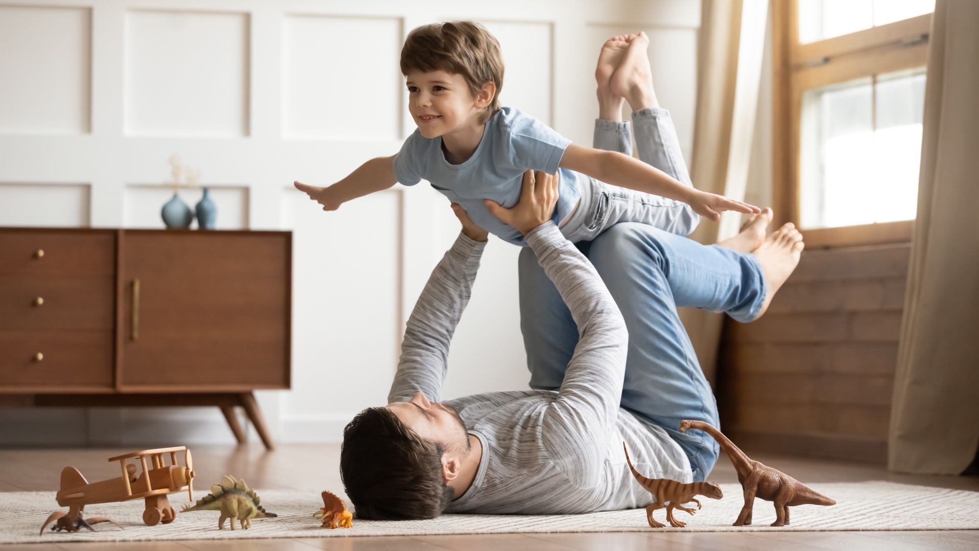 father playing with son